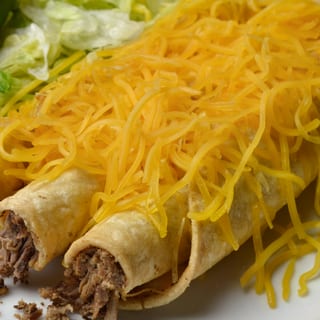 3 Rolled Tacos with Cheese