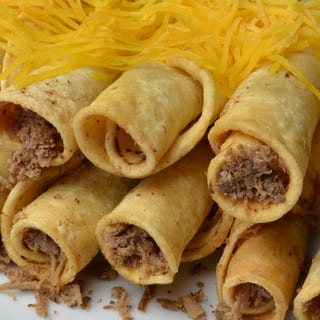 5 Rolled Tacos with Cheese